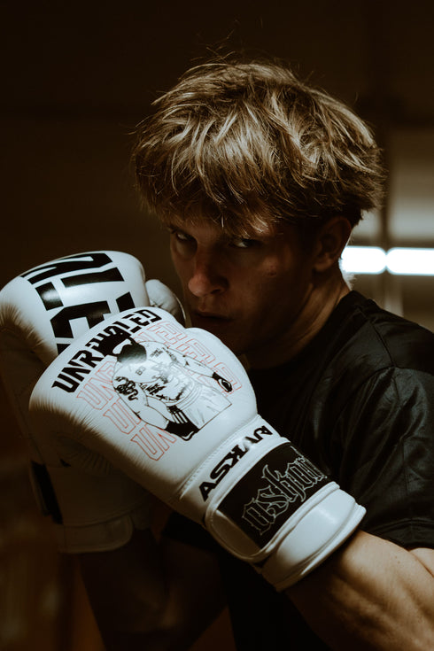 "UNRIVALED" BOXING GLOVES