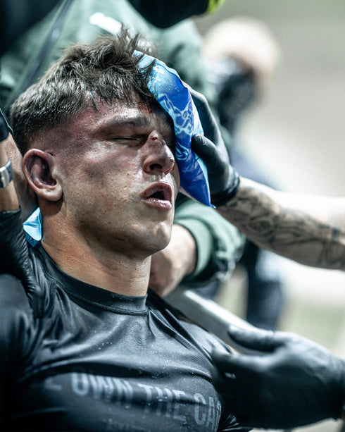 "WE OWN THE CAGE" RASHGUARD