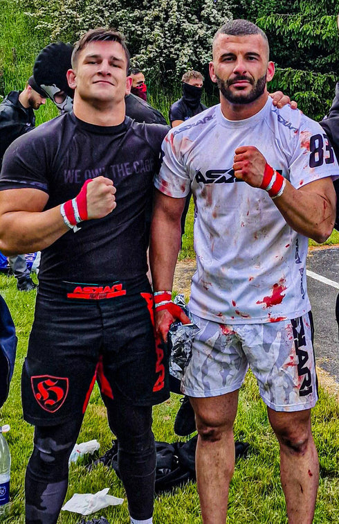 "WE OWN THE CAGE" RASHGUARD